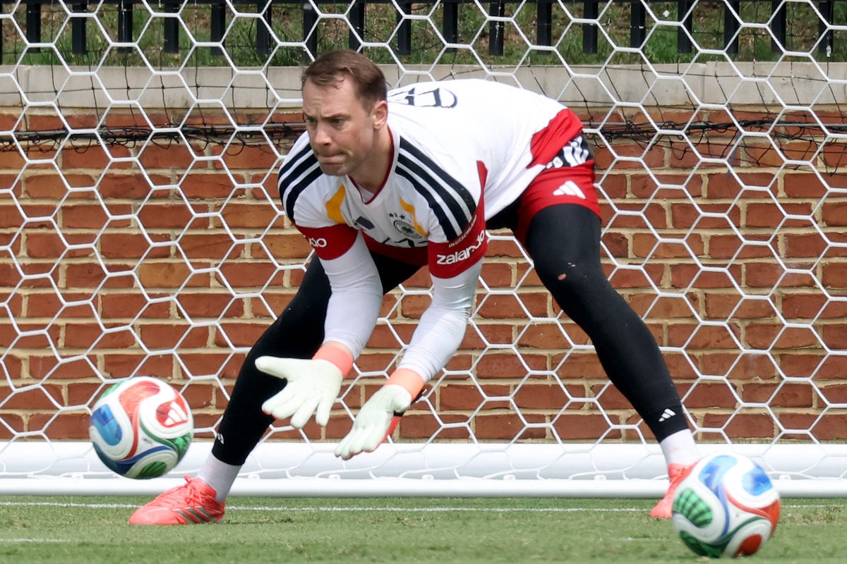 WINSTON-SALEM, NORTH CAROLINA - JUNE 18: Manuel Neuer of Germany, safes the ball during a Germany training session at Winston-Salem State University on June 18, 2026 in Winston-Salem, North Carolina. Alexander Hassenstein/Getty Images/AFP (Photo by ALEXANDER HASSENSTEIN / GETTY IMAGES NORTH AMERICA / Getty Images via AFP)